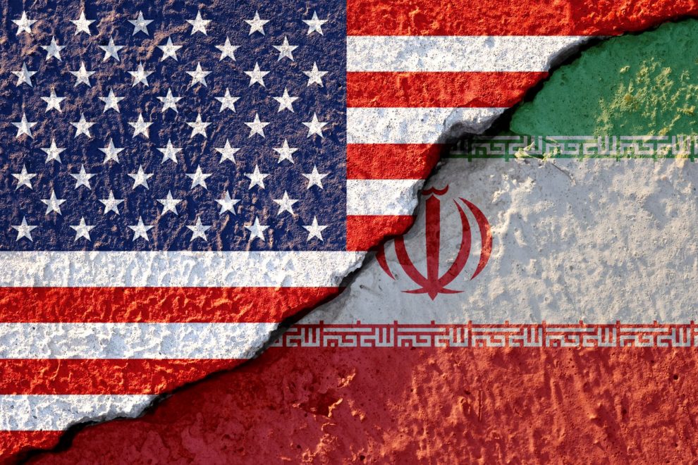 usa-flag-iran-flag-cracked-wall-damage